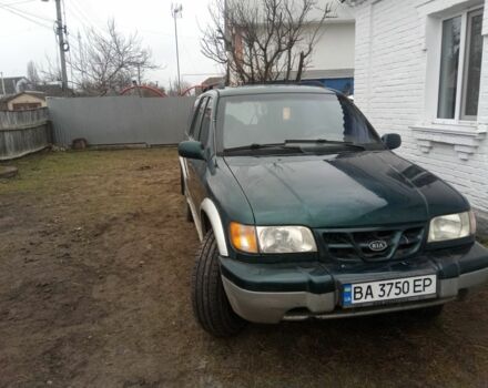 Зеленый Киа Sportage, объемом двигателя 2 л и пробегом 198 тыс. км за 3900 $, фото 2 на Automoto.ua