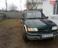Зелений Кіа Sportage, об'ємом двигуна 2 л та пробігом 198 тис. км за 3900 $, фото 1 на Automoto.ua