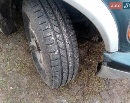 Зелений Кіа Sportage, об'ємом двигуна 2 л та пробігом 198 тис. км за 3900 $, фото 2 на Automoto.ua
