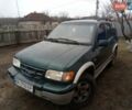 Зелений Кіа Sportage, об'ємом двигуна 2 л та пробігом 198 тис. км за 3900 $, фото 1 на Automoto.ua
