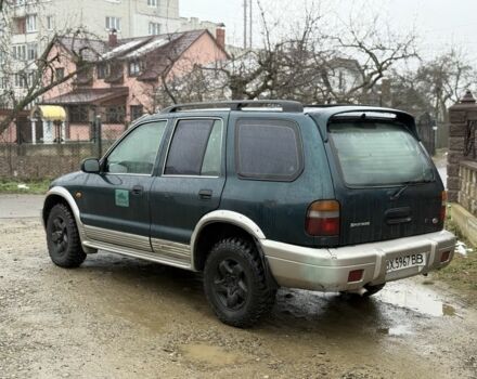 Зеленый Киа Sportage, объемом двигателя 2 л и пробегом 300 тыс. км за 3700 $, фото 5 на Automoto.ua