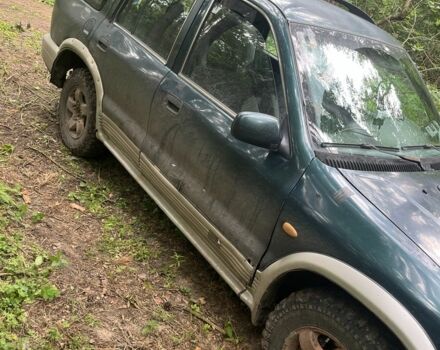 Зеленый Киа Sportage, объемом двигателя 2 л и пробегом 300 тыс. км за 3000 $, фото 3 на Automoto.ua