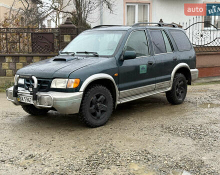 Зеленый Киа Sportage, объемом двигателя 2 л и пробегом 300 тыс. км за 3700 $, фото 2 на Automoto.ua