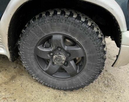 Зеленый Киа Sportage, объемом двигателя 2 л и пробегом 300 тыс. км за 3700 $, фото 3 на Automoto.ua