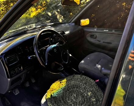 Зеленый Киа Sportage, объемом двигателя 2 л и пробегом 200 тыс. км за 3300 $, фото 6 на Automoto.ua