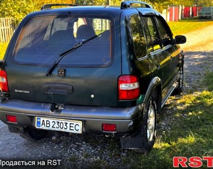 Зеленый Киа Sportage, объемом двигателя 2 л и пробегом 200 тыс. км за 3300 $, фото 2 на Automoto.ua