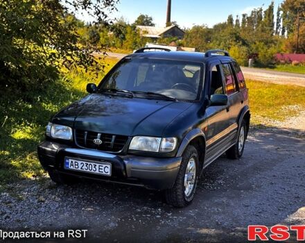 Зеленый Киа Sportage, объемом двигателя 2 л и пробегом 200 тыс. км за 3300 $, фото 4 на Automoto.ua