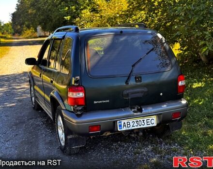 Зеленый Киа Sportage, объемом двигателя 2 л и пробегом 200 тыс. км за 3300 $, фото 1 на Automoto.ua