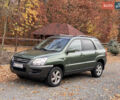 Зеленый Киа Sportage, объемом двигателя 2 л и пробегом 300 тыс. км за 3750 $, фото 3 на Automoto.ua
