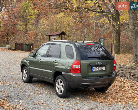 Зеленый Киа Sportage, объемом двигателя 2 л и пробегом 300 тыс. км за 3750 $, фото 11 на Automoto.ua