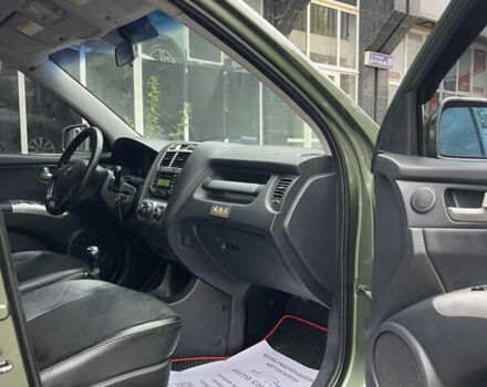Зелений Кіа Sportage, об'ємом двигуна 1.98 л та пробігом 370 тис. км за 6500 $, фото 19 на Automoto.ua