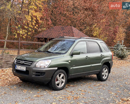 Зеленый Киа Sportage, объемом двигателя 2 л и пробегом 300 тыс. км за 3750 $, фото 2 на Automoto.ua