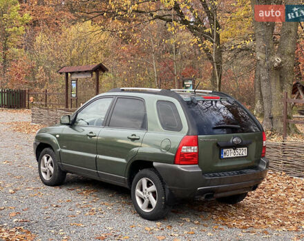 Зеленый Киа Sportage, объемом двигателя 2 л и пробегом 300 тыс. км за 3750 $, фото 14 на Automoto.ua