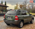 Зеленый Киа Sportage, объемом двигателя 2 л и пробегом 300 тыс. км за 3750 $, фото 17 на Automoto.ua
