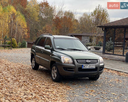 Зеленый Киа Sportage, объемом двигателя 2 л и пробегом 300 тыс. км за 3750 $, фото 5 на Automoto.ua