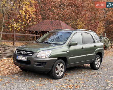 Зеленый Киа Sportage, объемом двигателя 2 л и пробегом 300 тыс. км за 3750 $, фото 1 на Automoto.ua