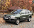 Зеленый Киа Sportage, объемом двигателя 2 л и пробегом 300 тыс. км за 3750 $, фото 1 на Automoto.ua
