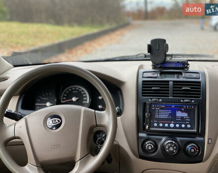 Зеленый Киа Sportage, объемом двигателя 2 л и пробегом 300 тыс. км за 3750 $, фото 23 на Automoto.ua