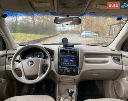 Зеленый Киа Sportage, объемом двигателя 2 л и пробегом 300 тыс. км за 3750 $, фото 24 на Automoto.ua