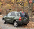 Зеленый Киа Sportage, объемом двигателя 2 л и пробегом 300 тыс. км за 3750 $, фото 13 на Automoto.ua