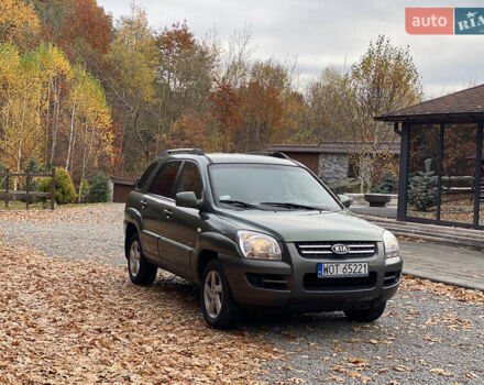 Зеленый Киа Sportage, объемом двигателя 2 л и пробегом 300 тыс. км за 3750 $, фото 4 на Automoto.ua
