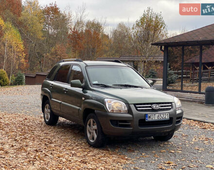 Зеленый Киа Sportage, объемом двигателя 2 л и пробегом 300 тыс. км за 3750 $, фото 6 на Automoto.ua