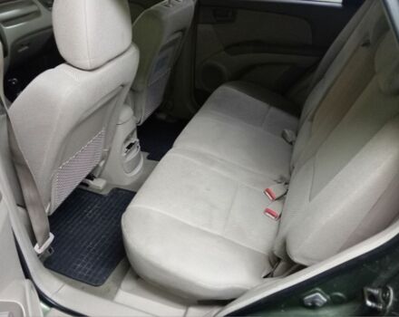 Зеленый Киа Sportage, объемом двигателя 2 л и пробегом 300 тыс. км за 4117 $, фото 6 на Automoto.ua