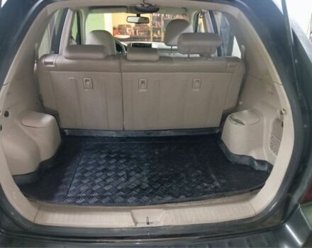 Зеленый Киа Sportage, объемом двигателя 2 л и пробегом 300 тыс. км за 4117 $, фото 7 на Automoto.ua