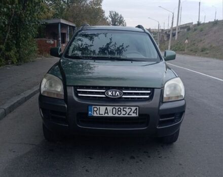 Зеленый Киа Sportage, объемом двигателя 2 л и пробегом 300 тыс. км за 4117 $, фото 1 на Automoto.ua