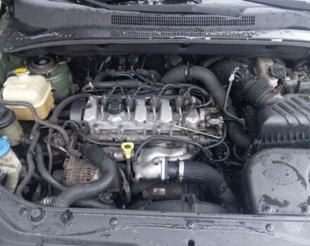 Зеленый Киа Sportage, объемом двигателя 2 л и пробегом 300 тыс. км за 4117 $, фото 4 на Automoto.ua