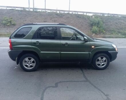 Зеленый Киа Sportage, объемом двигателя 2 л и пробегом 300 тыс. км за 4117 $, фото 3 на Automoto.ua