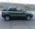 Зеленый Киа Sportage, объемом двигателя 2 л и пробегом 300 тыс. км за 4117 $, фото 3 на Automoto.ua
