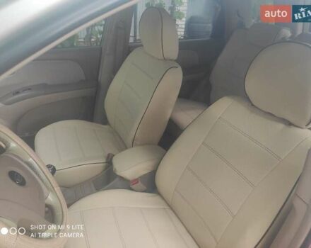 Зеленый Киа Sportage, объемом двигателя 1.98 л и пробегом 200 тыс. км за 7200 $, фото 2 на Automoto.ua