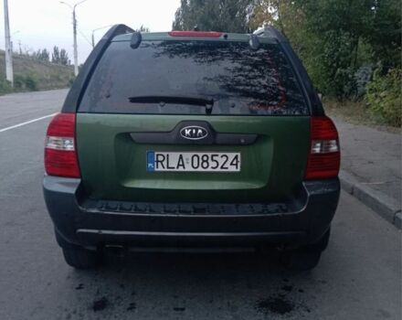 Зеленый Киа Sportage, объемом двигателя 2 л и пробегом 300 тыс. км за 4117 $, фото 2 на Automoto.ua