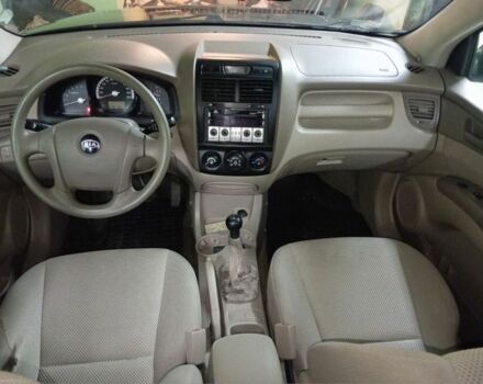 Зеленый Киа Sportage, объемом двигателя 2 л и пробегом 300 тыс. км за 4117 $, фото 5 на Automoto.ua