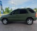 Зеленый Киа Sportage, объемом двигателя 2 л и пробегом 290 тыс. км за 4100 $, фото 4 на Automoto.ua