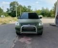 Зеленый Киа Sportage, объемом двигателя 2 л и пробегом 290 тыс. км за 4100 $, фото 2 на Automoto.ua