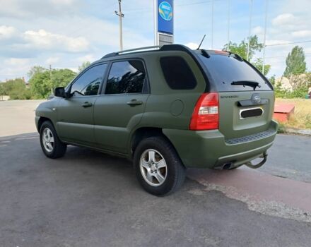 Зеленый Киа Sportage, объемом двигателя 2 л и пробегом 290 тыс. км за 4100 $, фото 5 на Automoto.ua