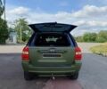 Зеленый Киа Sportage, объемом двигателя 2 л и пробегом 290 тыс. км за 4100 $, фото 8 на Automoto.ua