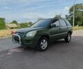 Зеленый Киа Sportage, объемом двигателя 2 л и пробегом 290 тыс. км за 4100 $, фото 1 на Automoto.ua