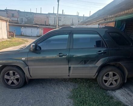 Зеленый Киа Sportage, объемом двигателя 2 л и пробегом 260 тыс. км за 6000 $, фото 1 на Automoto.ua