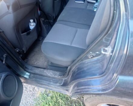 Зеленый Киа Sportage, объемом двигателя 2 л и пробегом 260 тыс. км за 6000 $, фото 5 на Automoto.ua