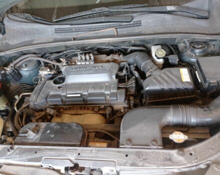 Зеленый Киа Sportage, объемом двигателя 2 л и пробегом 260 тыс. км за 6000 $, фото 8 на Automoto.ua