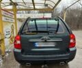 Зеленый Киа Sportage, объемом двигателя 2 л и пробегом 256 тыс. км за 6400 $, фото 3 на Automoto.ua