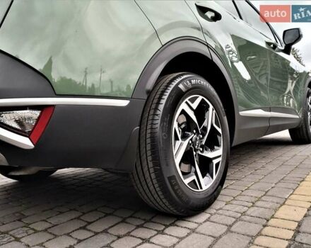 Зелений Кіа Sportage, об'ємом двигуна 2 л та пробігом 5 тис. км за 27800 $, фото 36 на Automoto.ua