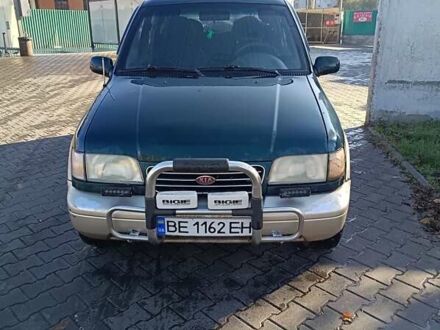 Зеленый Киа Sportage, объемом двигателя 2 л и пробегом 365 тыс. км за 4000 $, фото 1 на Automoto.ua