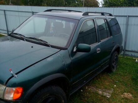 Зеленый Киа Sportage, объемом двигателя 2 л и пробегом 200 тыс. км за 1750 $, фото 1 на Automoto.ua