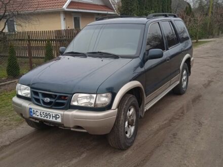 Зеленый Киа Sportage, объемом двигателя 2 л и пробегом 315 тыс. км за 3077 $, фото 1 на Automoto.ua