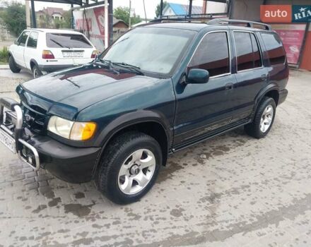 Зеленый Киа Sportage, объемом двигателя 2 л и пробегом 333 тыс. км за 3848 $, фото 1 на Automoto.ua