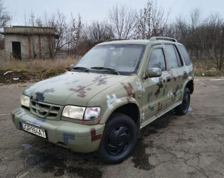 Зеленый Киа Sportage, объемом двигателя 2 л и пробегом 200 тыс. км за 1401 $, фото 1 на Automoto.ua